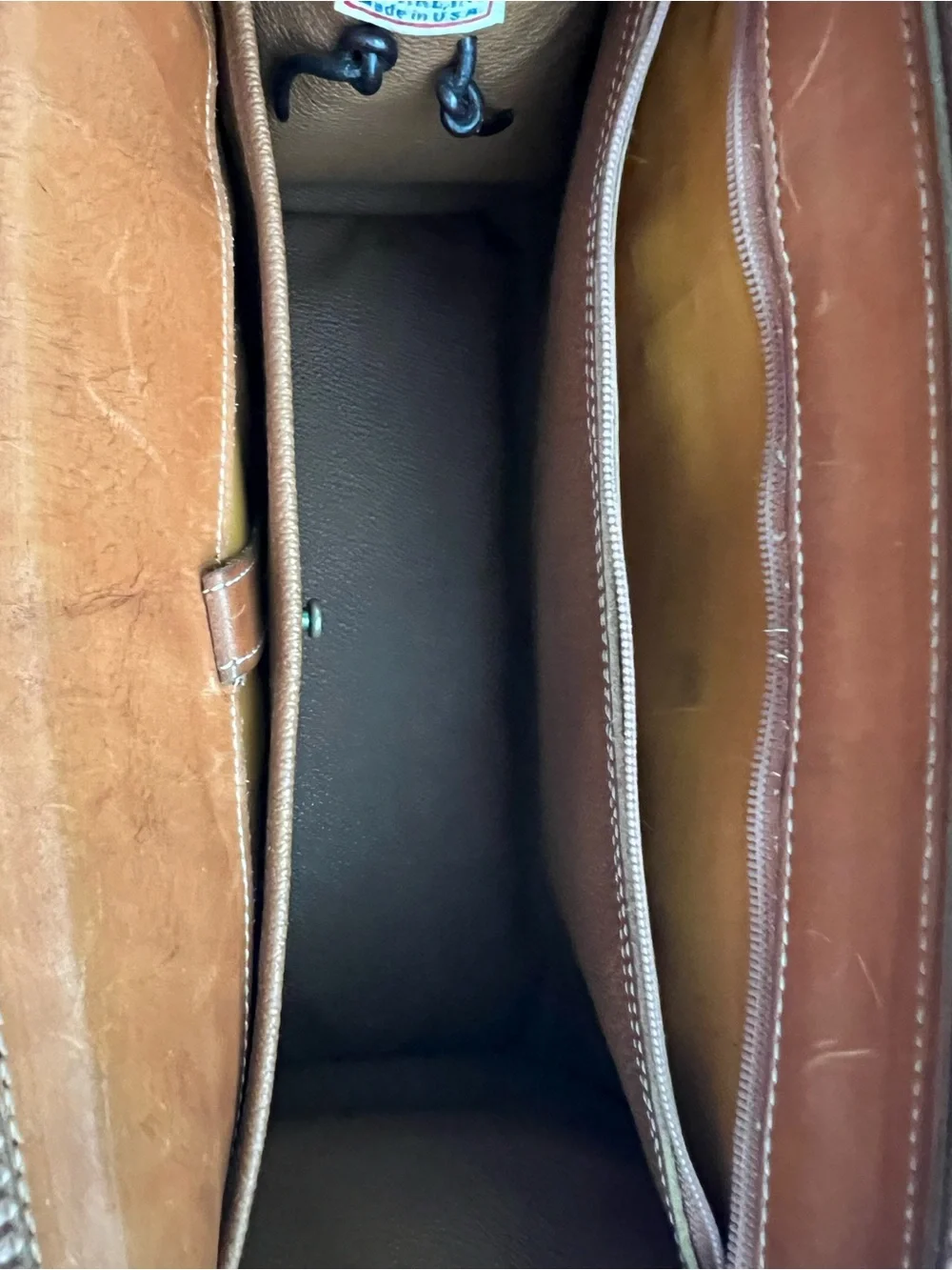 Dooney & Bourke VINTAGE black pebbled Leather satchel with British tan trim.